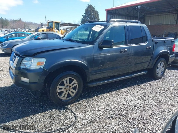 2010 Ford Explorer Sport Trac XLT with VIN 1FMEU5BE5AUF07305, listed as a IAAI auction lot 41631185 with 240,290 mi miles. Bid and sale history available at carsss.com. Image 2.