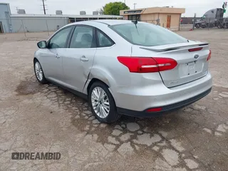 2017 Ford Focus Titanium with VIN 1FADP3J24HL229702, listed as a IAAI auction lot 42057013 with 120,250 mi miles and . Bid and sale history available at DreamBid. Image 3.