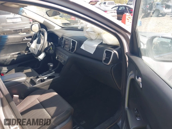 2017 Kia Sportage LX with VIN KNDPM3AC7H7166208, listed as a IAAI auction lot 41910485 with 100,211 mi miles. Bid and sale history available at carsss.com. Image 5.
