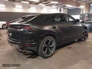 2019 Lamborghini Urus with VIN ZPBUA1ZL4KLA03222, listed as a IAAI auction lot 41920029 with 57,055 mi miles. Bid and sale history available at carsss.com. Image 4.