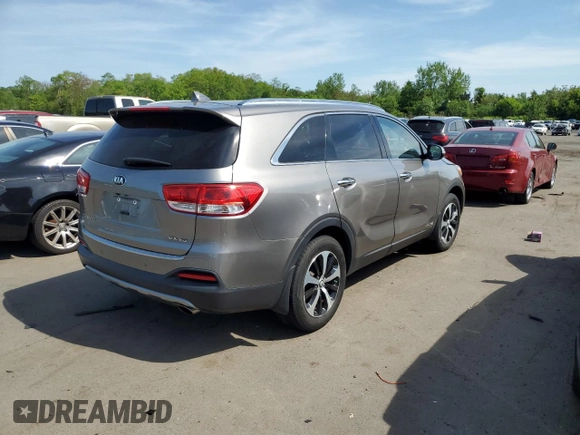 2017 Kia Sorento EX z VIN 5XYPHDA56HG232245, wystawiony jako Copart lot #56305625 z przebiegiem 76 947 mil mil oraz Szkoda całkowita • Salvage title. Historia ofert i sprzedaży dostępna na DreamBid. Obrazek 3.