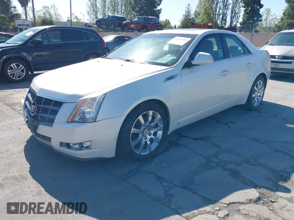 2008 Cadillac CTS RWD z VIN 1G6DV57V280142396, wystawiony jako IAAI lot #42086055 z przebiegiem 183 113 mil mil oraz . Historia ofert i sprzedaży dostępna na DreamBid. Obrazek 2.