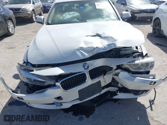 2014 BMW 3 Series 328i xDrive with VIN WBA3B3G51ENR81859, listed as a IAAI auction lot 41828729 with 129,498 mi miles. Bid and sale history available at carsss.com. Image 6.