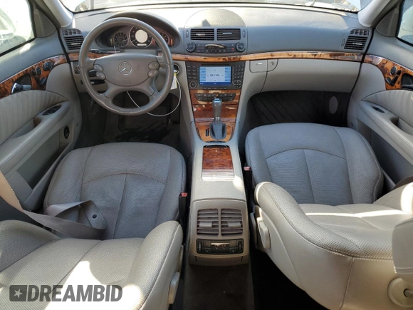 2007 Mercedes-Benz E 550 with VIN WDBUF90X77X212587, listed as a Copart auction lot 79753664 with 111,768 mi miles and Salvage Title. Bid and sale history available at carsss.com. Image 8.