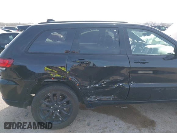 2018 Jeep Grand Cherokee Laredo E with VIN 1C4RJEAG4JC311699, listed as a IAAI auction lot 41876920 with 42,584 mi miles and . Bid and sale history available at DreamBid. Image 6.