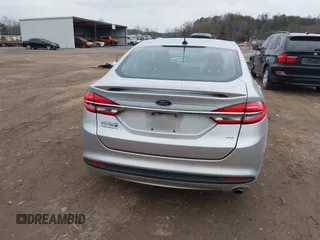 2017 Ford Fusion SE z VIN 3FA6P0H78HR174956, wystawiony jako IAAI lot #41258610 z przebiegiem 70 180 mil mil oraz . Historia ofert i sprzedaży dostępna na DreamBid. Obrazek 16.