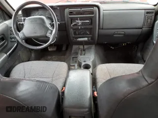 1999 Jeep Cherokee Sport with VIN 1J4FT68S2XL580915, listed as a Copart auction lot 50374875 with 286,276 mi miles and Salvage Title. Bid and sale history available at carsss.com. Image 8.
