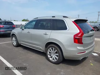 2016 Volvo XC90 T6 Momentum with VIN YV4A22PK7G1038750, listed as a IAAI auction lot 42128057 with 124,112 mi miles. Bid and sale history available at carsss.com. Image 3.