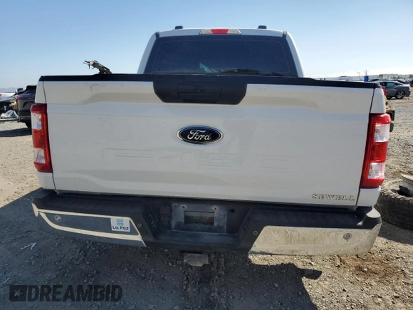 2021 Ford F-150 XL with VIN 1FTFW1E50MFC05081, listed as a Copart auction lot 63128785 with Not provided miles and Salvage title. Bid and sale history available at DreamBid. Image 6.