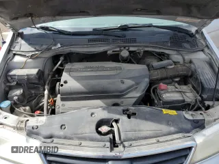 2002 Honda Odyssey EX z VIN 2HKRL186X2H006763, wystawiony jako Copart lot #57317075 z przebiegiem 282 090 mil mil oraz Szkoda całkowita • Salvage title. Historia ofert i sprzedaży dostępna na DreamBid. Obrazek 12.