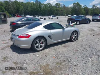 2006 Porsche Cayman S с VIN WP0AB29826U781513, выставлен на аукционе IAAI как лот 42634933 с пробегом 99 237 миль миль и . История ставок и продаж доступна на DreamBid. Изображение 4.