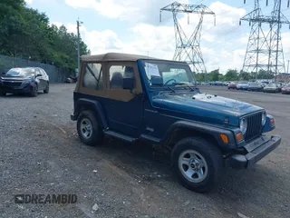 1997 Jeep Wrangler SE z VIN 1J4FY29P2VP446769, wystawiony jako IAAI lot #42782194 z przebiegiem 98 352 mil mil oraz . Historia ofert i sprzedaży dostępna na DreamBid. Obrazek 1.