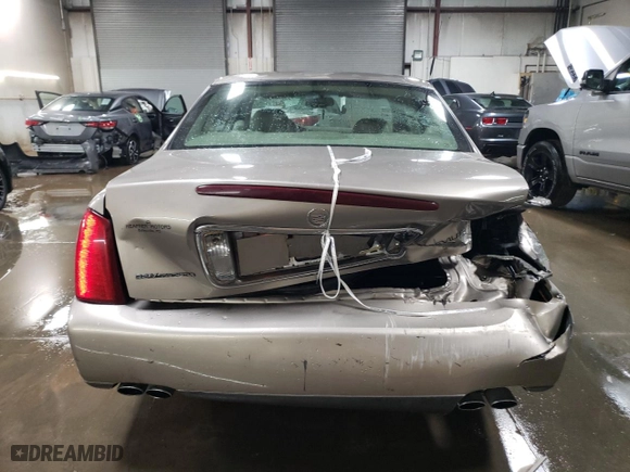 2002 Cadillac DeVille with VIN 1G6KD54Y42U268154, listed as a Copart auction lot 49239915 with 86,167 mi miles and Salvage Title. Bid and sale history available at carsss.com. Image 6.
