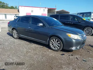 2011 Toyota Avalon with VIN 4T1BK3DB5BU371257, listed as a IAAI auction lot 42543983 with 111,502 mi miles and . Bid and sale history available at DreamBid. Image 1.