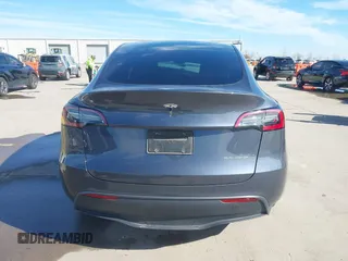 2023 Tesla Model Y Long Range with VIN 7SAYGDEE1PA060410, listed as a IAAI auction lot 41357943 with 19,072 mi miles. Bid and sale history available at carsss.com. Image 16.