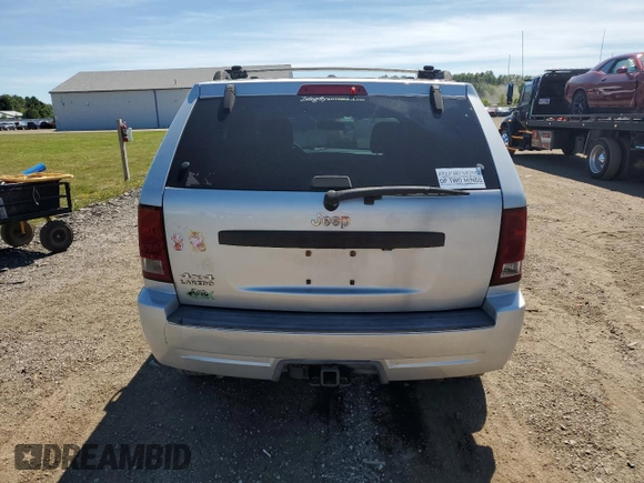 2009 Jeep Grand Cherokee Laredo with VIN 1J8HR48P29C537653, listed as a Copart auction lot 70190404 with 192,796 mi miles and Salvage Title. Bid and sale history available at carsss.com. Image 6.