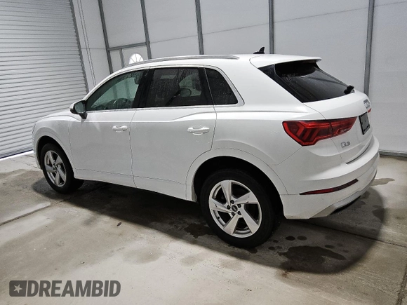 2021 Audi Q3 Premium with VIN WA1AUCF34M1090677, listed as a Copart auction lot 56111815 with 93,573 mi miles and Clean title. Bid and sale history available at DreamBid. Image 2.