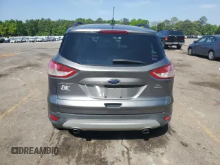 2014 Ford Escape SE z VIN 1FMCU9G91EUC77505, wystawiony jako Copart lot #52913005 z przebiegiem 119 299 mil mil oraz Szkoda całkowita • Salvage title. Historia ofert i sprzedaży dostępna na DreamBid. Obrazek 6.