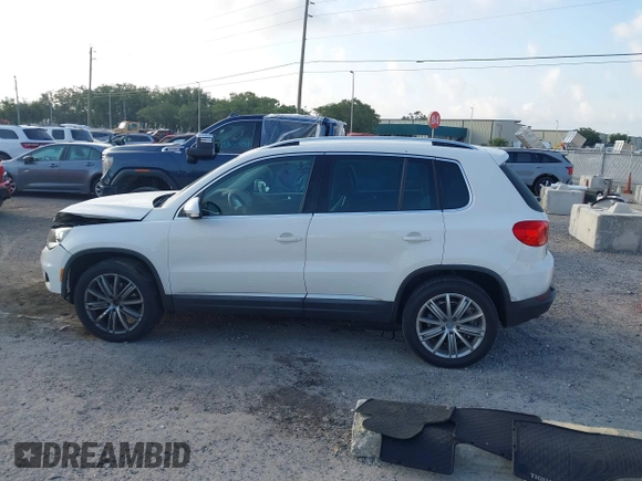 2013 Volkswagen Tiguan SE with VIN WVGAV7AX5DW545202, listed as a IAAI auction lot 42318584 with 91,556 mi miles and . Bid and sale history available at DreamBid. Image 14.