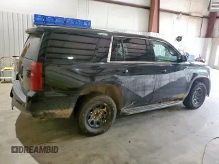 2020 Chevrolet Tahoe Commercial z VIN 1GNLCDEC0LR307321, wystawiony jako Copart lot #57272485 z przebiegiem 124 925 mil mil oraz Szkoda całkowita • Salvage title. Historia ofert i sprzedaży dostępna na DreamBid. Obrazek 3.