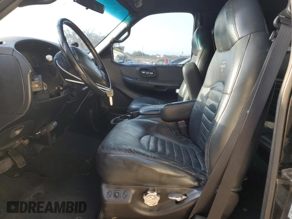 2000 Ford F-150 XL with VIN 2FTRX07L1YCA89598, listed as a Copart auction lot 55571645 with 235,923 mi miles and Salvage title. Bid and sale history available at DreamBid. Image 7.