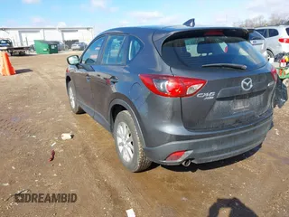 2016 Mazda CX-5 Sport with VIN JM3KE4BY5G0829927, listed as a IAAI auction lot 41678552 with 121,476 mi miles. Bid and sale history available at carsss.com. Image 3.