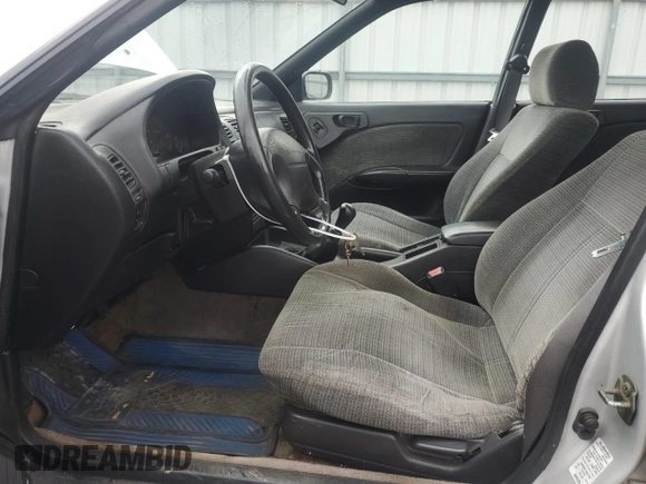 1998 Subaru Legacy L with VIN 4S3BK435XW6316402, listed as a Copart auction lot 60301805 with 288,744 mi miles and Salvage title. Bid and sale history available at DreamBid. Image 7.