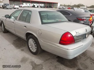 2010 Mercury Grand Marquis LS with VIN 2MEBM7FV5AX633703, listed as a IAAI auction lot 41728720 with 1 mi miles. Bid and sale history available at carsss.com. Image 3.