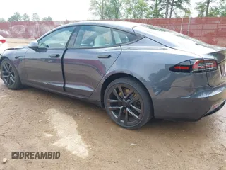 2023 Tesla Model S with VIN 5YJSA1E53PF511231, listed as a IAAI auction lot 41924626 with Not provided miles and . Bid and sale history available at DreamBid. Image 3.