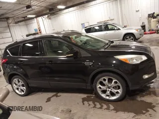 2014 Ford Escape Titanium with VIN 1FMCU9J95EUD85537, listed as a IAAI auction lot 41472236 with 154,796 mi miles. Bid and sale history available at carsss.com. Image 13.