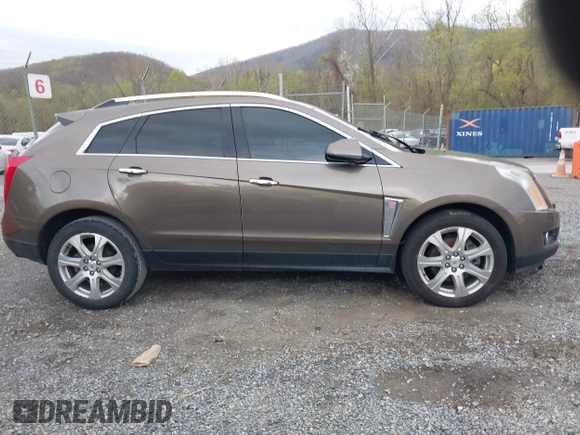 2014 Cadillac SRX Performance Collection with VIN 3GYFNCE33ES570472, listed as a IAAI auction lot 41971511 with 200,811 mi miles. Bid and sale history available at carsss.com. Image 13.