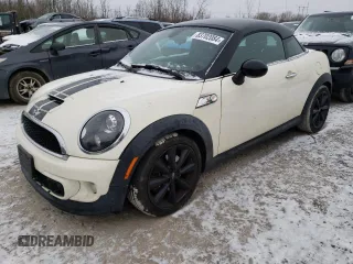 2013 MINI Coupe S with VIN WMWSX3C56DT772517, listed as a Copart auction lot 83702084 with 106,910 mi miles and Clean Title. Bid and sale history available at DreamBid. Image 1.