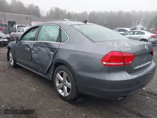 2012 Volkswagen Passat SE with VIN 1VWBP7A37CC011521, listed as a IAAI auction lot 41876767 with 125,543 mi miles. Bid and sale history available at carsss.com. Image 3.