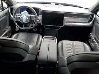 2024 Rivian R1S Adventure with VIN 7PDSGABA7RN038477, listed as a Copart auction lot 48711345 with 0 mi miles and Salvage Title. Bid and sale history available at carsss.com. Image 8.