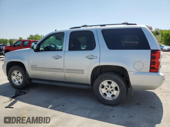 2013 Chevrolet Tahoe LT with VIN 1GNSKBE0XDR144736, listed as a Copart auction lot 58484995 with 218,448 mi miles and Clean title. Bid and sale history available at DreamBid. Image 2.