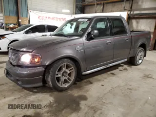 2002 Ford F-150 Harley Davidson with VIN 1FTRW07392KE05237, listed as a Copart auction lot 87451334 with 175,986 mi miles and Salvage Title. Bid and sale history available at carsss.com. Image 1.