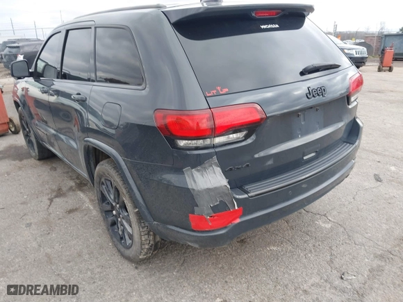 2018 Jeep Grand Cherokee Laredo E with VIN 1C4RJFAG0JC267822, listed as a IAAI auction lot 40876905 with 136,491 mi miles. Bid and sale history available at carsss.com. Image 3.