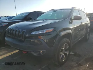 2014 Jeep Cherokee Trailhawk z VIN 1C4PJMBS7EW191714, wystawiony jako Copart lot #53276455 z przebiegiem 245 896 mil mil oraz Szkoda całkowita • Salvage title. Historia ofert i sprzedaży dostępna na DreamBid. Obrazek 1.