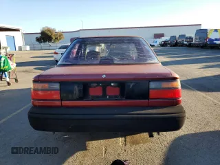 1989 Toyota Corolla with VIN JT2AE92E4K0112945, listed as a Copart auction lot 83382604 with 209,462 mi miles and Salvage title. Bid and sale history available at DreamBid. Image 6.
