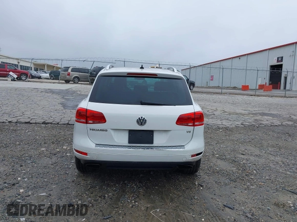 2012 Volkswagen Touareg Sport z VIN WVGEF9BP0CD006506, wystawiony jako IAAI lot #42355432 z przebiegiem 175 346 mil mil oraz . Historia ofert i sprzedaży dostępna na DreamBid. Obrazek 16.
