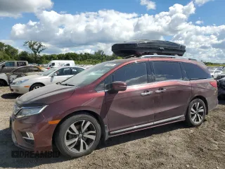 2018 Honda Odyssey Touring with VIN 5FNRL6H8XJB500004, listed as a Copart auction lot 70344524 with 91,226 mi miles and Salvage Title. Bid and sale history available at carsss.com. Image 1.