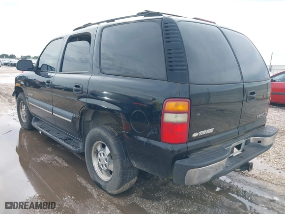 2003 Chevrolet Tahoe LT with VIN 1GNEC13Z83R264751, listed as a IAAI auction lot 41898933 with 300,977 mi miles. Bid and sale history available at carsss.com. Image 3.