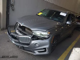 2018 BMW X5 xDrive40e iPerformance with VIN 5UXKT0C59J0V98760, listed as a IAAI auction lot 40983738 with 126,278 mi miles. Bid and sale history available at carsss.com. Image 22.