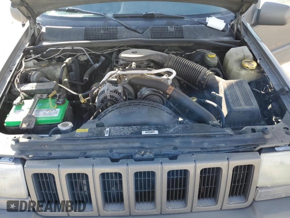 1997 Jeep Grand Cherokee Limited with VIN 1J4GZ78Y4VC754624, listed as a Copart auction lot 49884435 with 144,682 mi miles and Salvage Title. Bid and sale history available at carsss.com. Image 13.