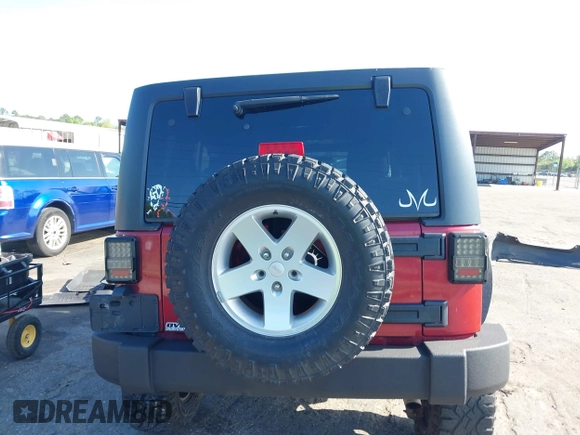 2011 Jeep Wrangler Unlimited Sport with VIN 1J4BA3H18BL598323, listed as a IAAI auction lot 41958043 with 154,354 mi miles. Bid and sale history available at carsss.com. Image 16.