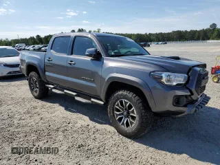 2022 Toyota Tacoma SR z VIN 3TYCZ5AN8NT076536, wystawiony jako Copart lot #55268985 z przebiegiem 57 697 mil mil oraz Szkoda całkowita • Salvage title. Historia ofert i sprzedaży dostępna na DreamBid. Obrazek 4.