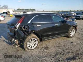 2023 Cadillac XT4 FWD Luxury with VIN 1GYAZAR49PF102307, listed as a Copart auction lot 49342465 with 21,093 mi miles and Salvage Title. Bid and sale history available at DreamBid. Image 3.