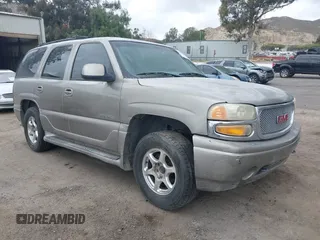 2001 GMC Yukon Denali z VIN 1GKEK63U01J248282, wystawiony jako IAAI lot #42034450 z przebiegiem Nie podano mil oraz . Historia ofert i sprzedaży dostępna na DreamBid. Obrazek 1.