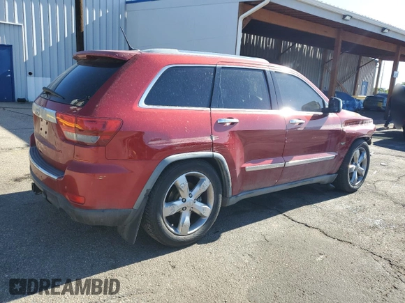 2011 Jeep Grand Cherokee Overland with VIN 1J4RR6GT8BC606688, listed as a Copart auction lot 57182295 with 100,423 mi miles and Salvage title. Bid and sale history available at DreamBid. Image 3.