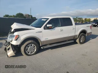 2012 Ford F-150 XL with VIN 1FTFW1ETXCFC61719, listed as a Copart auction lot 61606485 with 188,963 mi miles and Salvage title. Bid and sale history available at DreamBid. Image 1.